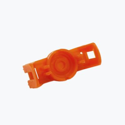 attache de moteur orange